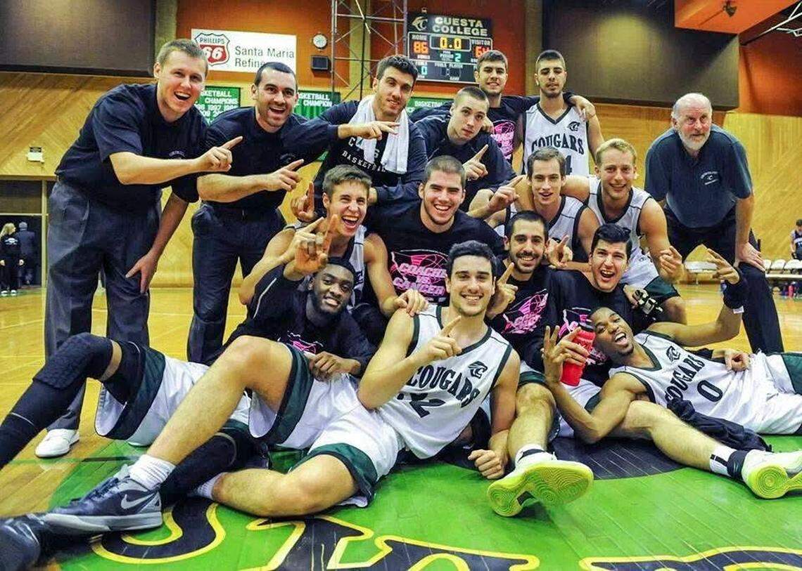 The Cuesta Cougars pose after a first-place finish under Head Coach Rusty Blair and assistant coach Alex Engel.