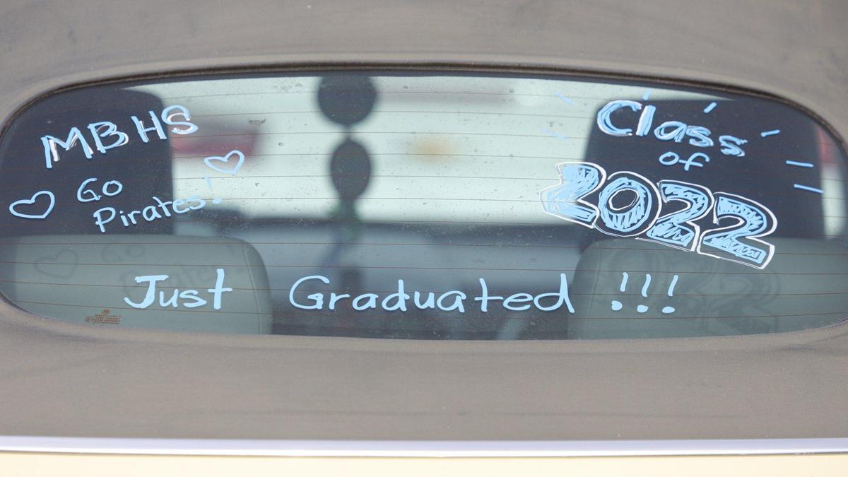 Sign on a car in the parking lot. Morro Bay High School held graduation ceremony at the football stadium June 9, 2022.