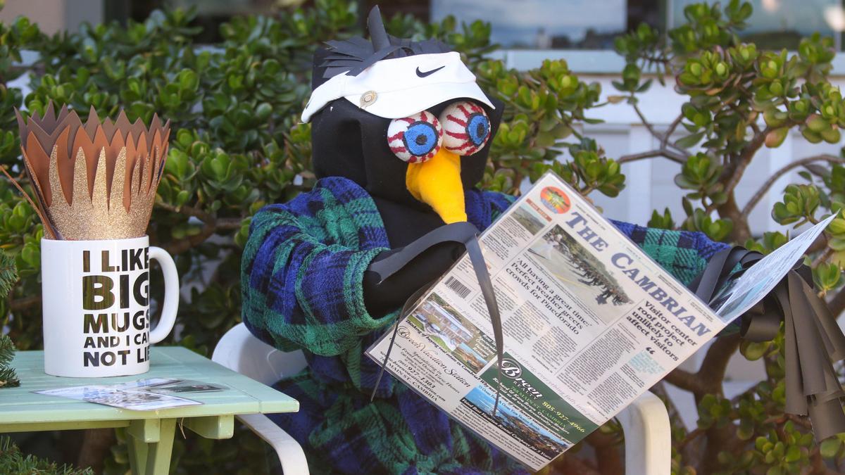 Espresso Crow created by Breen Realty. Scarecrows are wandering the streets of Cambria and San Simeon as the October festival is underway.
