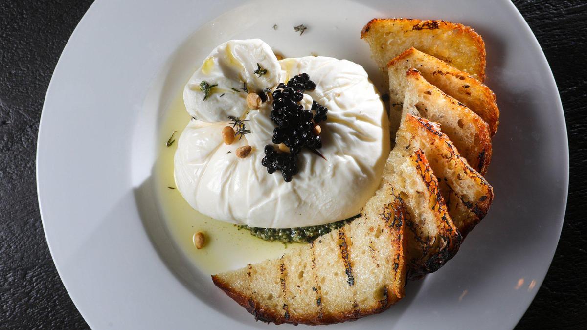 Cielo Ristorante’s Burrata Cloud features imported burrata, basil citrus pesto, lemon oil, pine nuts, grilled focaccia and balsamic pearls.