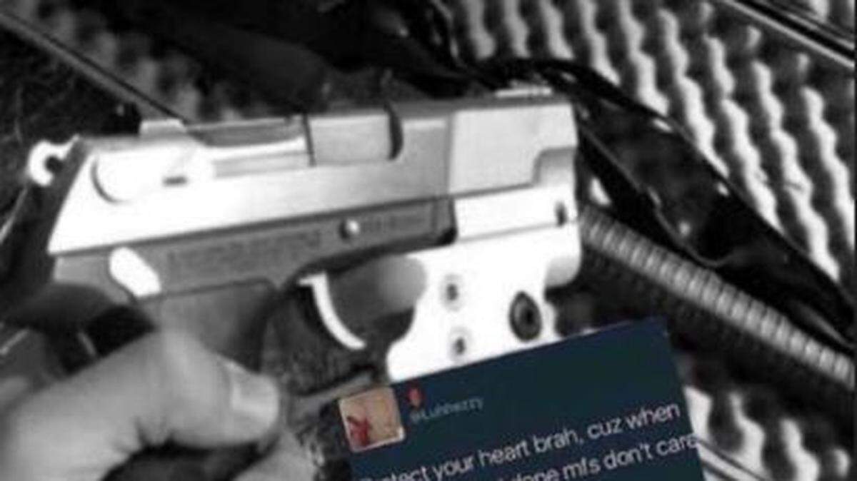 The Snapchat post created by two Paso Robles teenagers appears to depict someone holding a handgun, with another gun shown in the background.