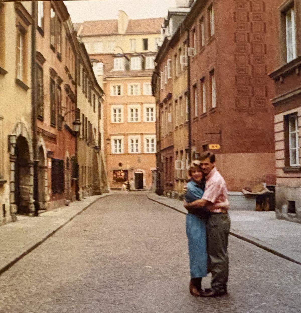 Susan Miller, Cal Poly grad and retired CIA agent, hugs husband Andy in Vilnius, Lithuania, after the fall of the Soviet Union.