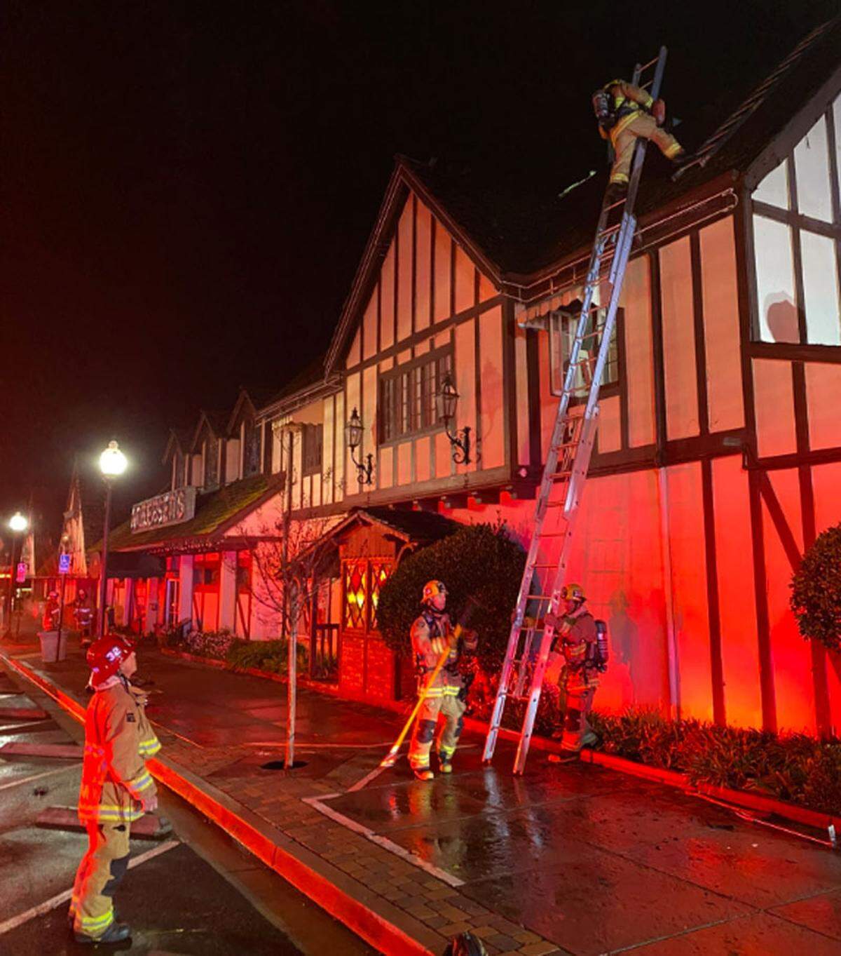 Firefighters respond to a roof fire at the Pea Soup Andersen’s Restaurant in Buellton on Sunday, Feb. 26, 2023.