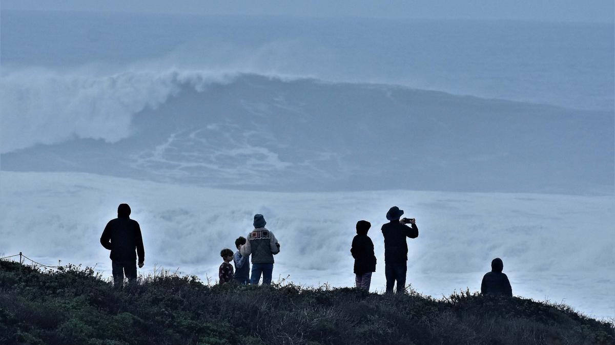 A group of people watching the waves at Montaña de Oro State Park on Thursday, Jan. 5.