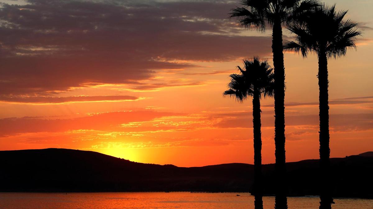 High clouds make for a colorful sunset in Shell Beach on Thursday evening, Sept. 8, 2022.