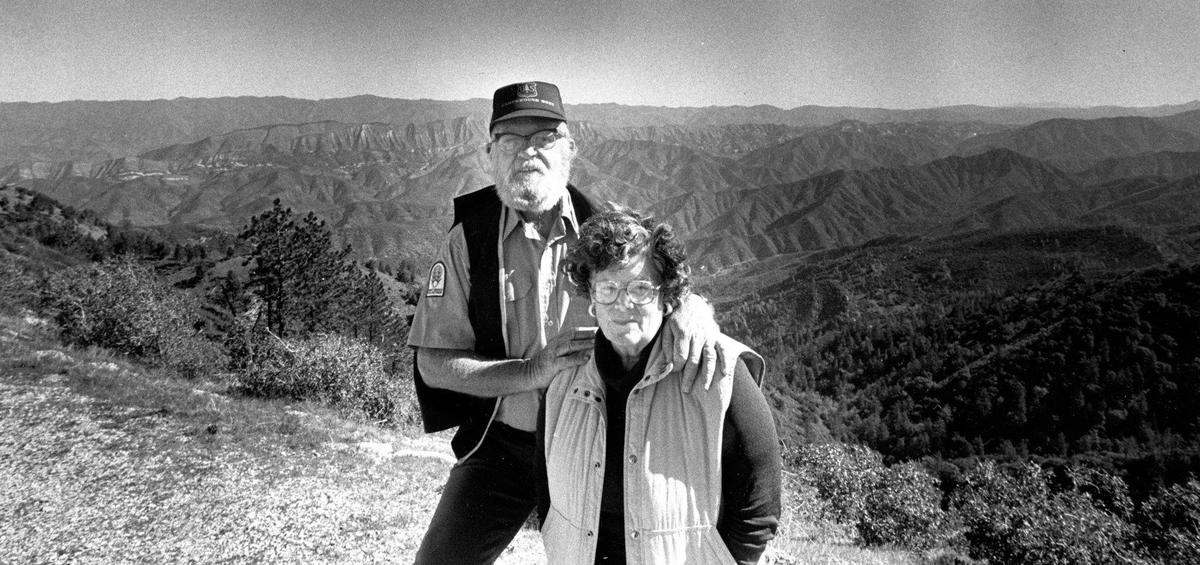 Former Floridians Jim and Nina Crank stand in front of the expansive San Rafael Wilderness Area near their Forest Service home on Figueroa Mountain. This photo was originally published in April 1988 with a series of stories in the Telegram-Tribune on the Los Padres National Forest.