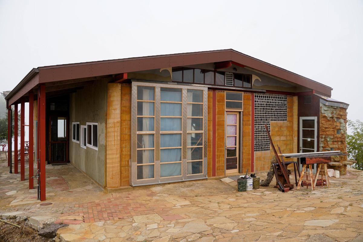 San Luis Obispo County homeowners Cam and Janeen Schiff spent 15 years turning a 40-acre mountaintop property between Cayucos and Atascadero into an ecologically-friendly home, pictured Wednesday, Sept. 25, 2024. Cam Schiff built the home primarily using reused materials, including steel beams from a decommissioned Lockheed Martin plant.