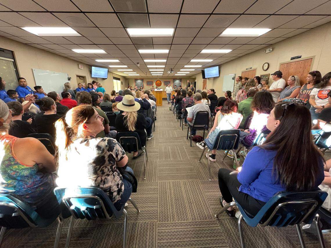 Community members overflow the Atascadero Unified School District’s board of trustees meeting room on Tuesday, Aug. 15, to speak about the LGBTQ+ Pride flag being flown in classrooms.