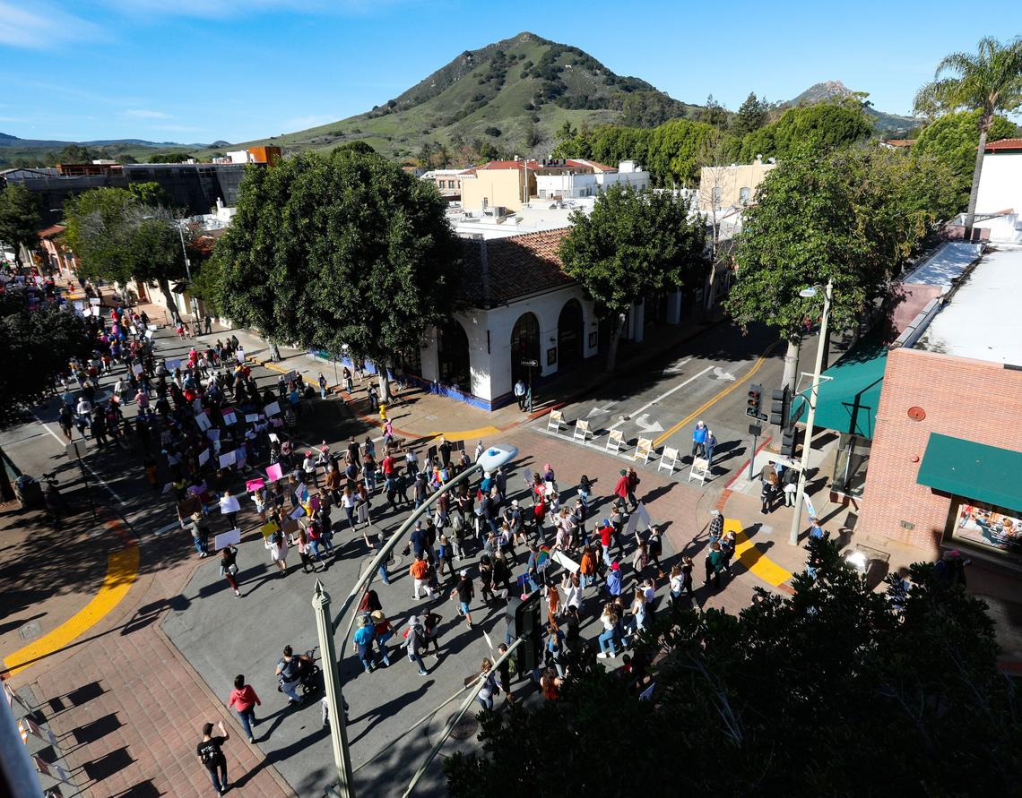 San Luis Obispo Women’s March of 2019 started at Mitchell Park with speeches then took about 3,000 participants on a walk through town. The view at the corner of Marsh Street and Chorro Street, Cerro San Luis in background.