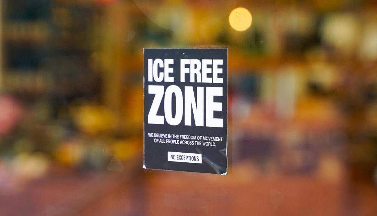 An “ICE Free Zone” sticker on the window of the Lush store in San Luis Obispo indicates that undocumented immigrants are safe on the store’s premises, Tuesday, Jan. 21, 2025.