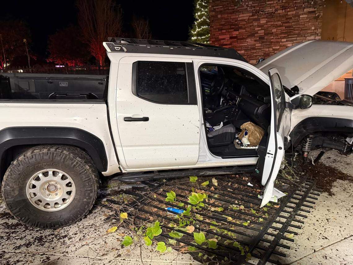 The San Luis Obispo Police Department arrested a driver for suspected driving under the influence after they crashed a pickup truck through a fence and into the patio of SESLOC Credit Union late Monday, Dec. 29, 2025.