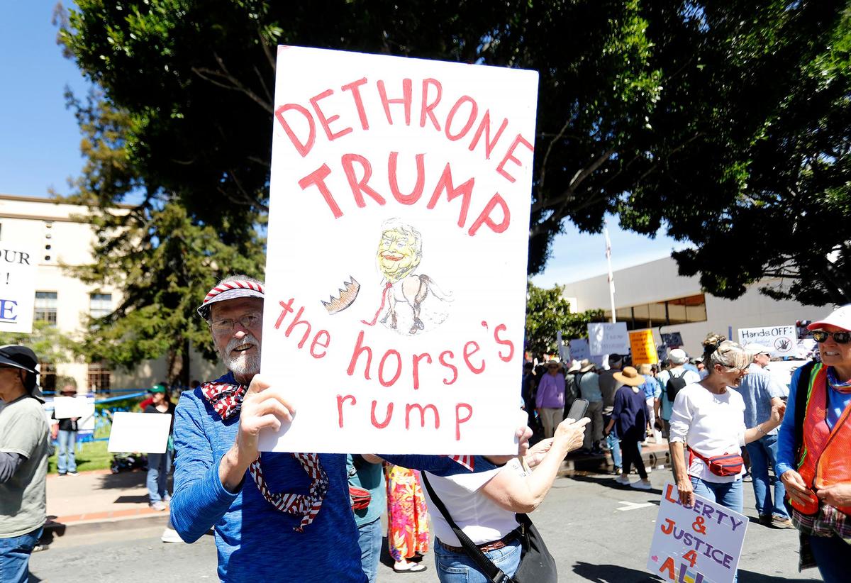 Thousands of people gather at San Luis Obispo Superior Court in California as part of the “Hands Off!” rally to protest President Donald Trump and his advisor Elon Musk.