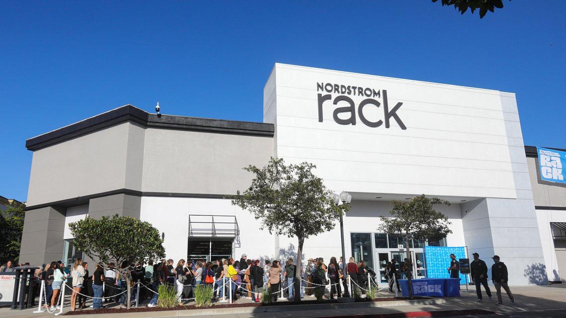 People line up for an invitation-only event at the new Nordstrom Rack store on Oct. 24, 2023. The store is in the SLO Promenade near REI, Sprouts and Hobby Lobby.