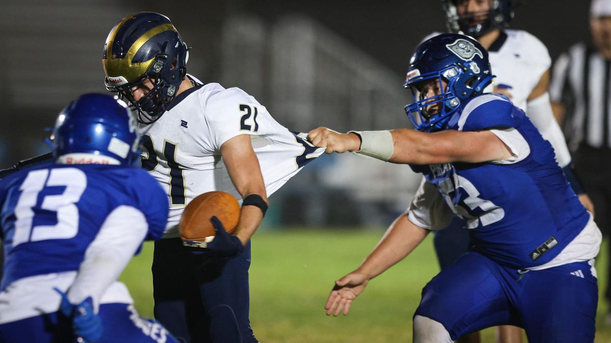 Ishaan Patel makes a shirt tackle of Ethan Allen. Morro Bay beat Golden Valley of Bakersfield 40-14 on Sept. 13, 2024.