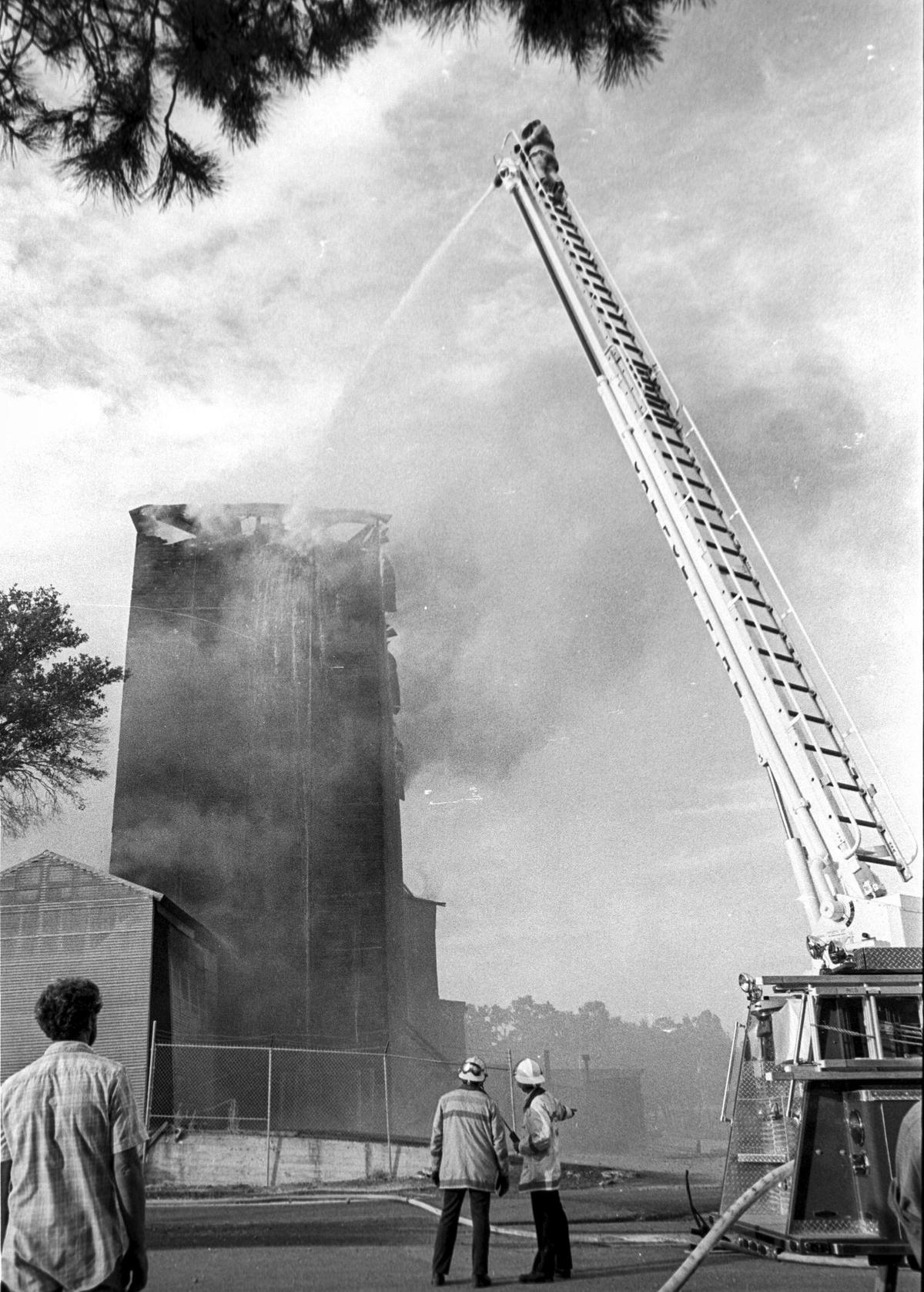 Templeton Feed & Grain was damaged but survived an Aug. 24, 1979, fire. Spectators gathered along the old highway, now South Main Street, to watch firefighters work.