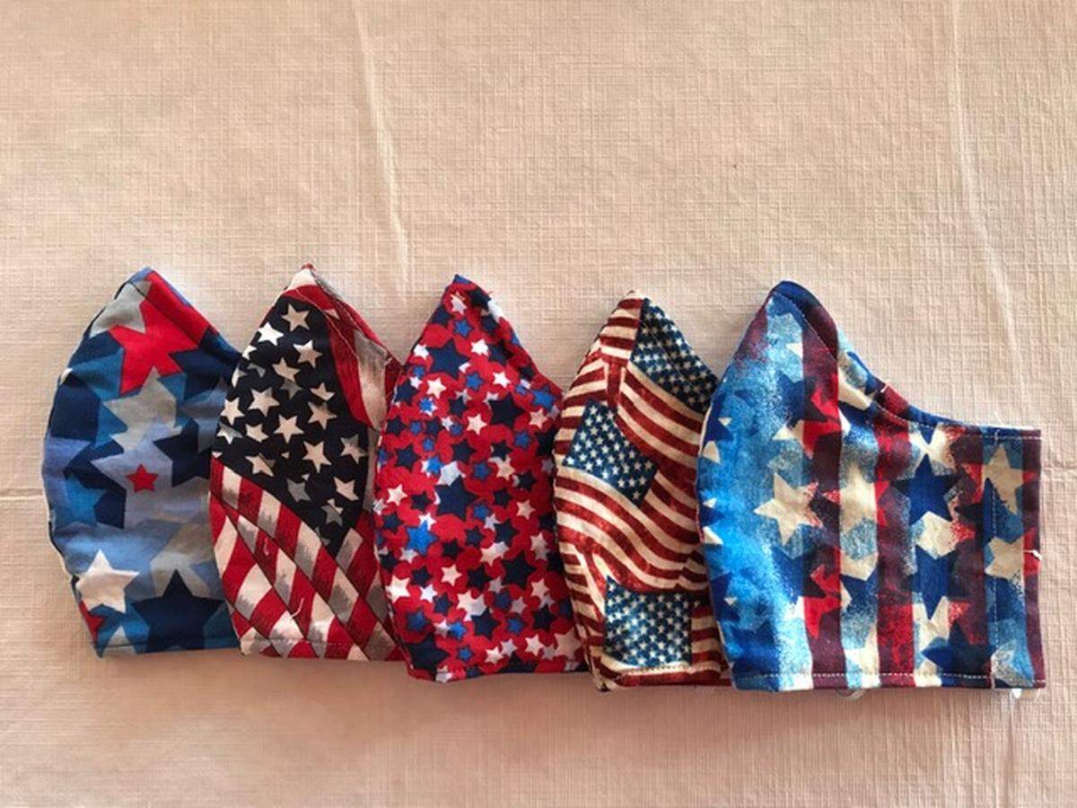 These are just a few of the 200 or more masks seamstress Karen Dean of Cambria has stitched up and donated to community members.