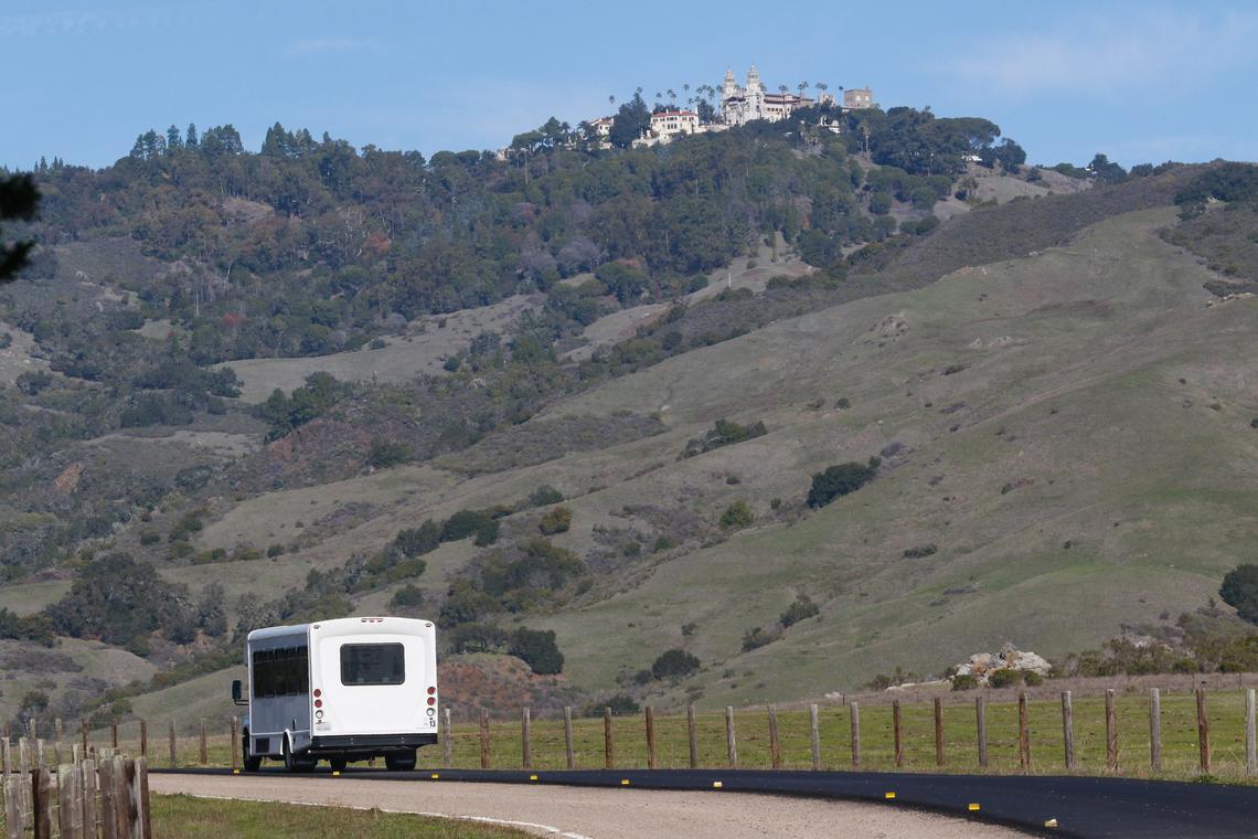 A tour bus heads out Tuesday from the Hearst Castle Visitor Center toward the hilltop in 2018.