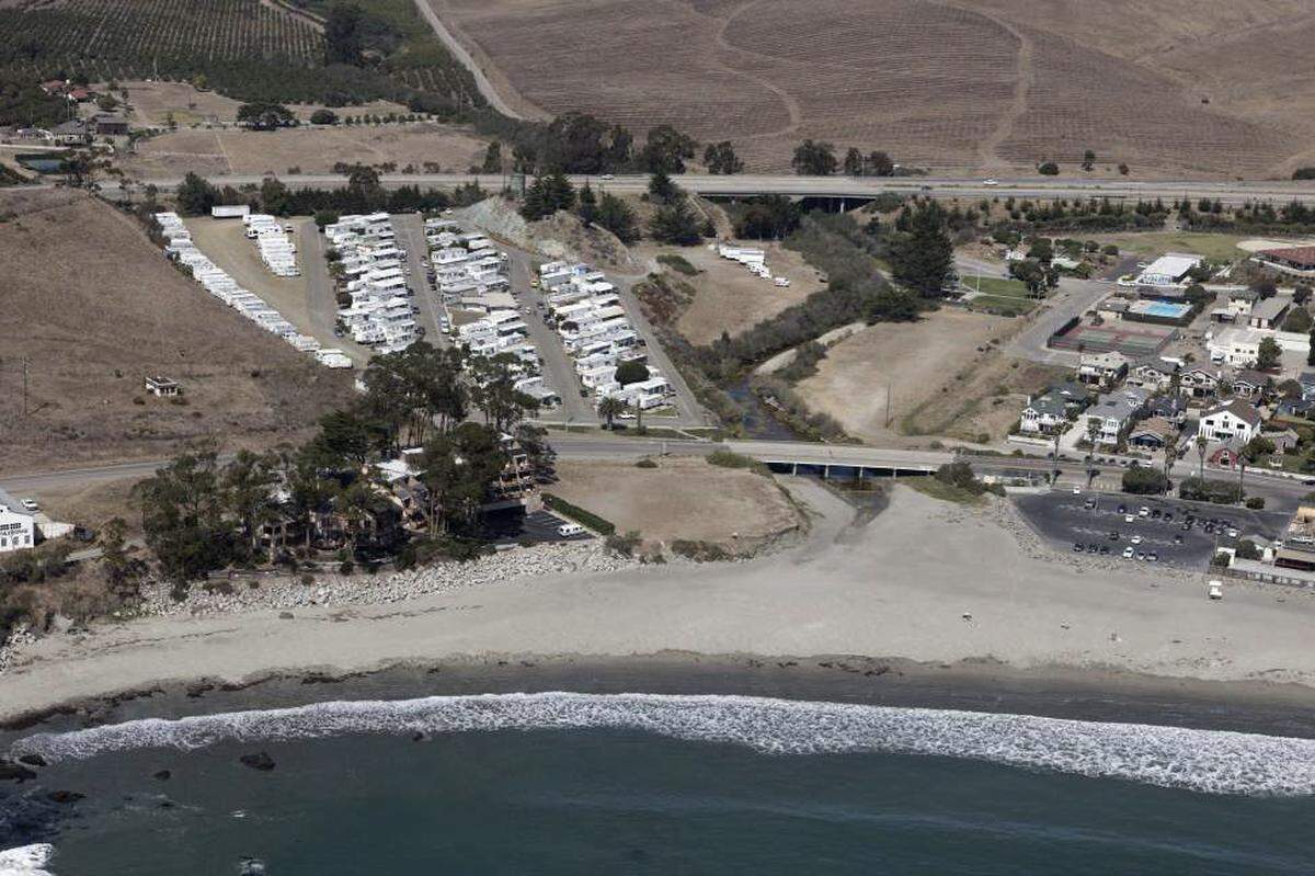 A boutique resort hotel proposed in Cayucos would be located on an oceanfront parcel across from the Bella Vista by the Sea RV park, just north of the creek looking toward the pier. The parcel is in the middle as seen in this 2010 photo.