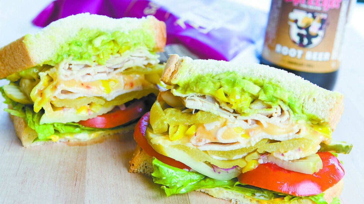The hefty Lincoln Ortega features turkey or beef, Ortega chilies, pepper jack cheese and avocado on sliced sourdough.
