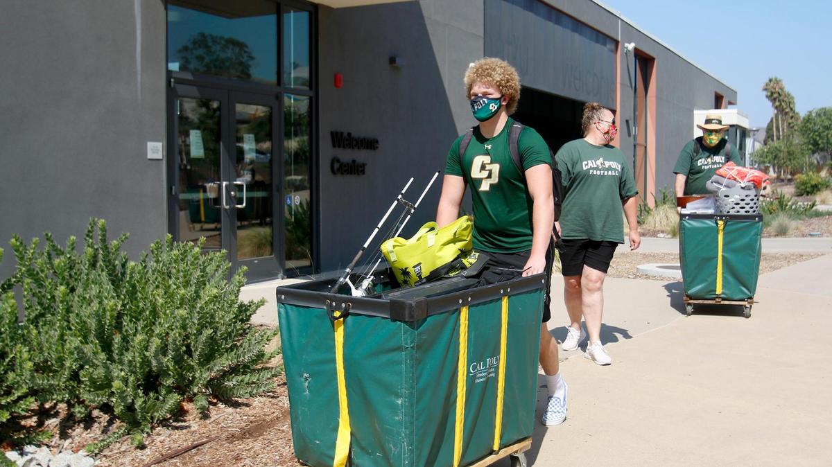 Cal Poly student Austin Anderson on move-in day. The university is reporting more than 800 COVID-19 cases.
