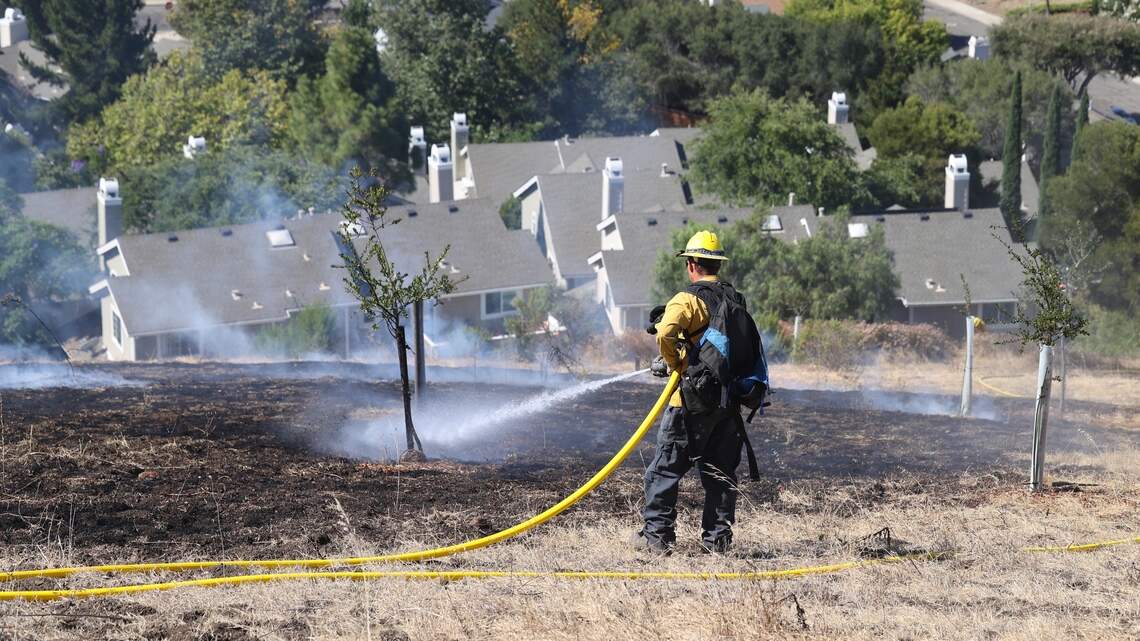 Residents briefly shelter in place as fire burns hillside near SLO neighborhood