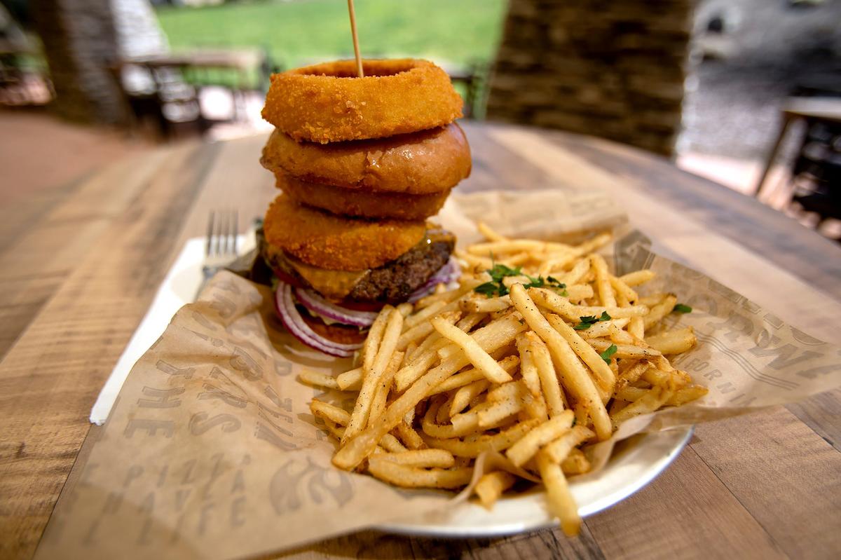 A new Blast & Brew location is opening this Friday, April 5, 2024 in Atascadero. Blast & Brew’s Cowboy Burger with fries is about 8 inches tall.