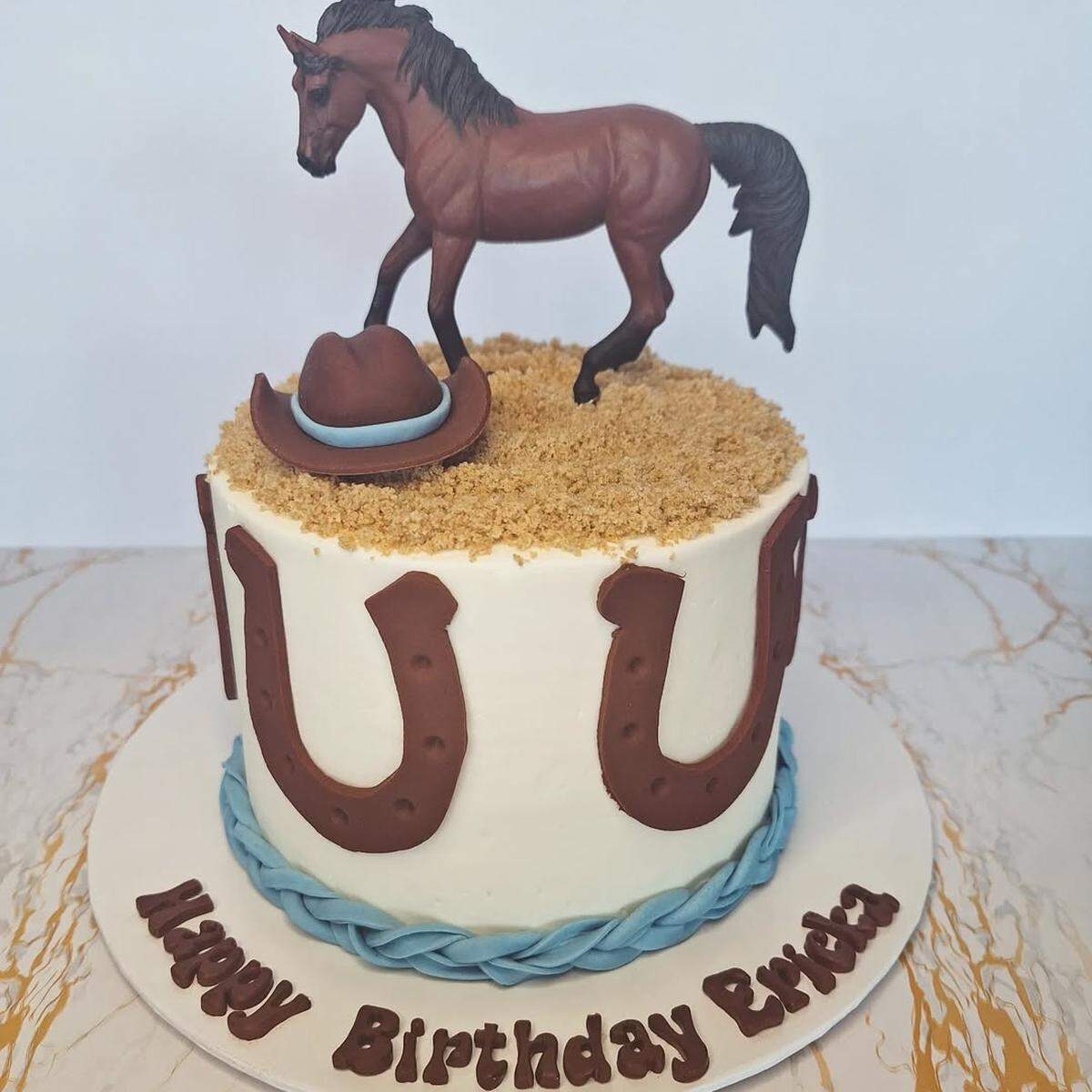 The cowgirl-inspired birthday cake was baked by Mercedes White in April 2025. White is opening a new bakery in Atascadero called Wendy White’s Bakery. 