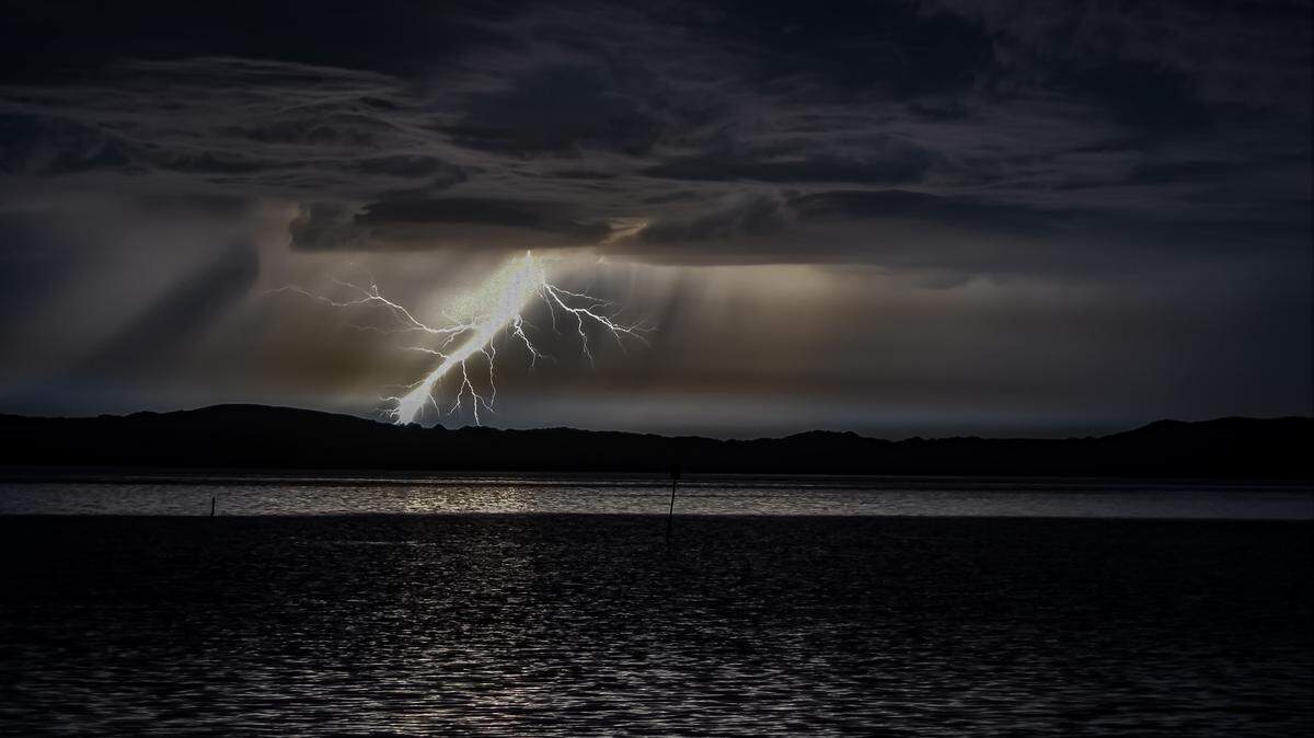 Lightning strikes the Pacific Ocean off the coast of Morro Bay.