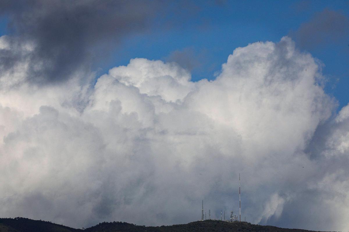 Clouds gather behind the antennas on TV Tower Road along the west Cuesta Ridge, seen on March 13, 2025.