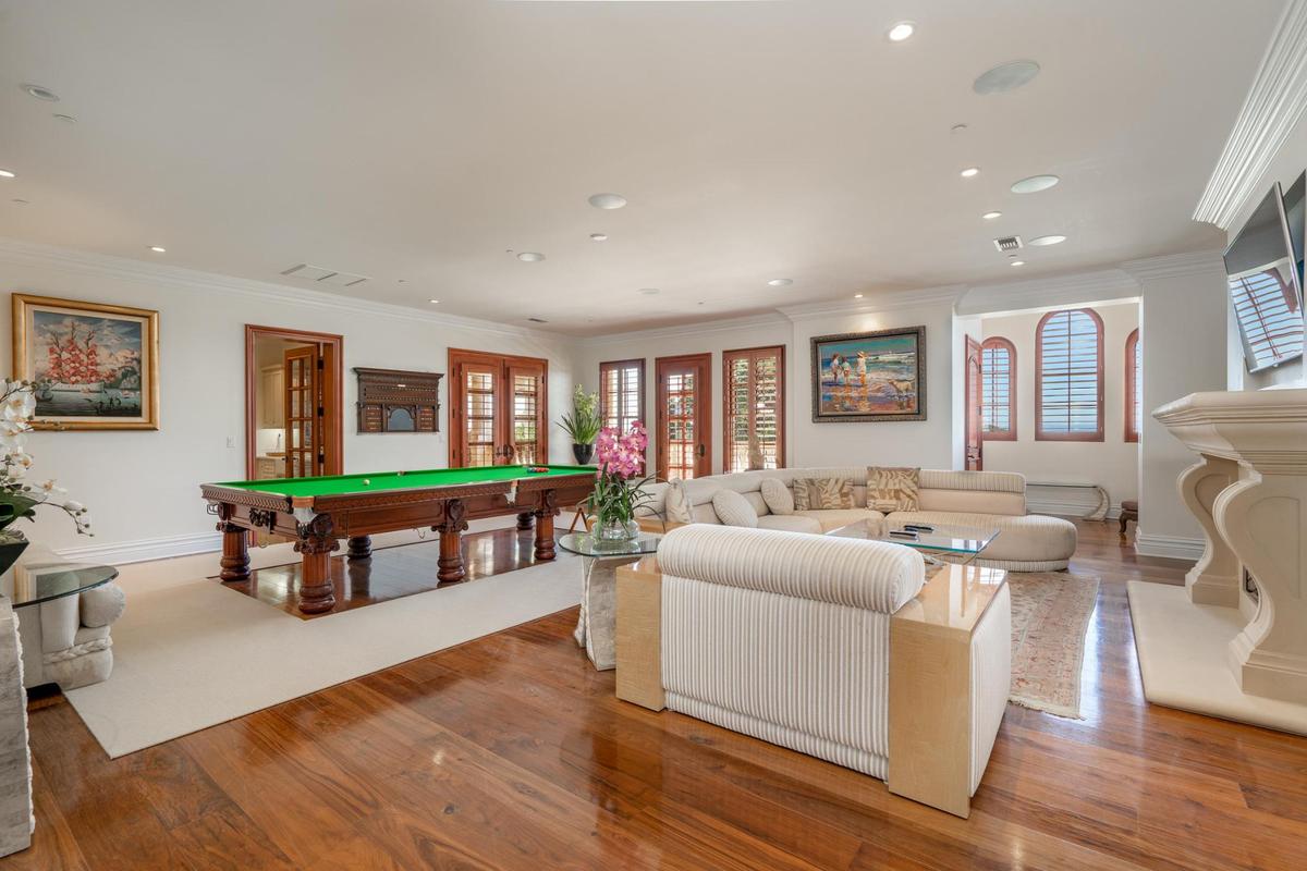 The living room of one of the two 3,700-square-foot villas at Villa San-Juliette. The property owned by “American Idol” producers Ken Warwick and Nigel Lythgoe will go up for auction on May 17, 2025.
