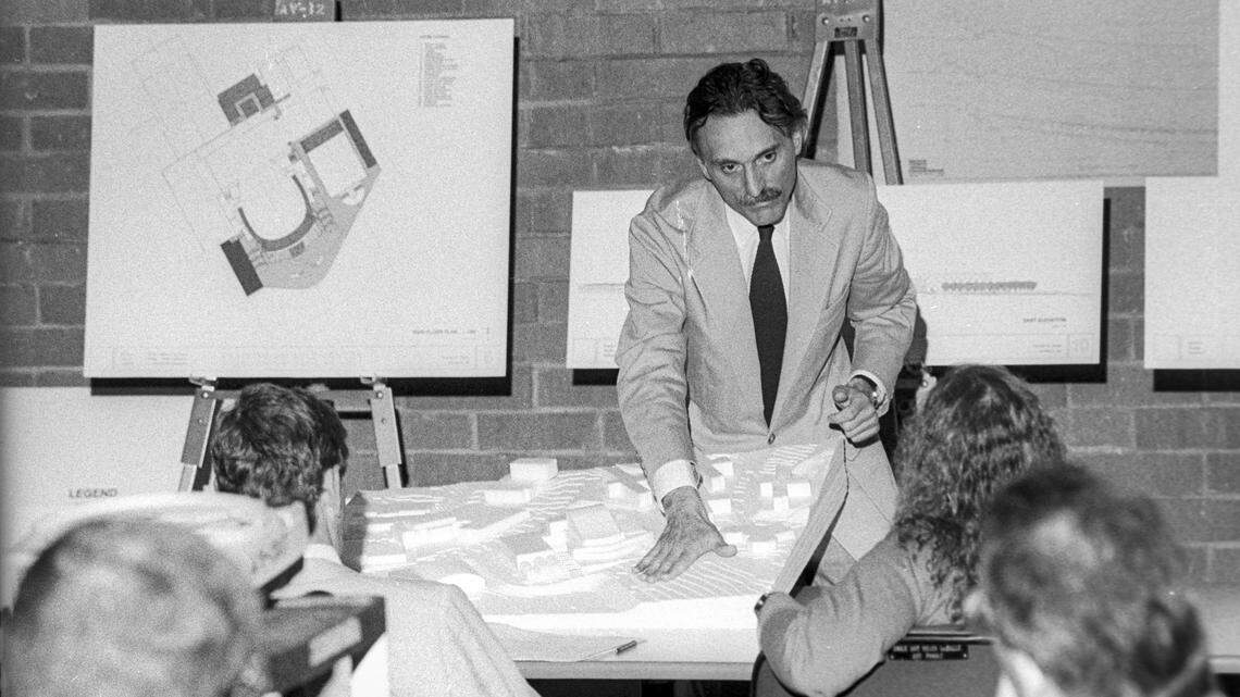 Architect Alberto Bertoli, a Cal Poly graduate, explains his design for the Performing Arts Center to members of the Cal Poly planning committee on Oct. 31, 1990.