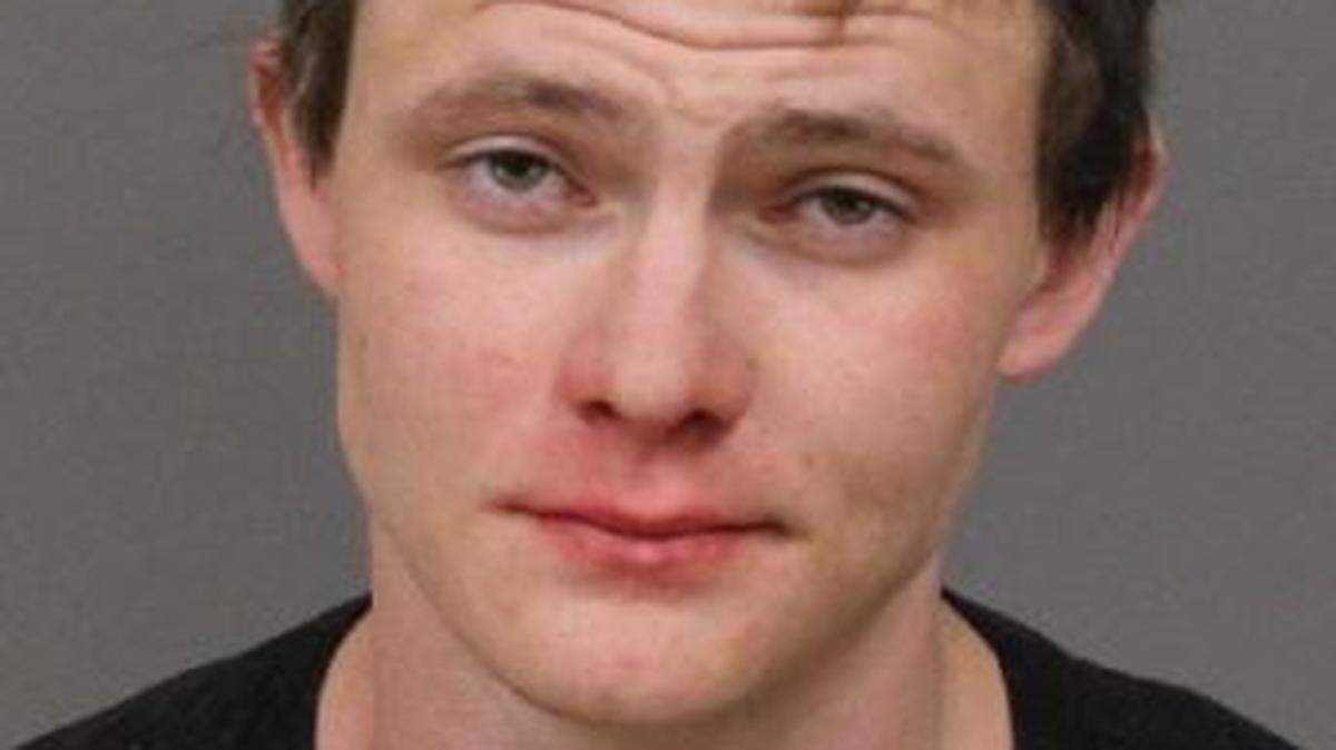 Christian Ellman, 21, was arrested Friday after allegedly stealing booze from the Marsh Street CVS while threatening an employee that he had a gun.