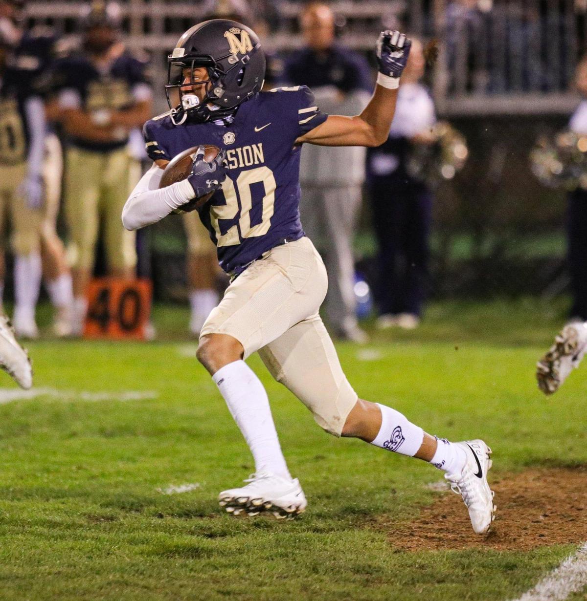 Jayden Nozil runs for the Royals. Mission Prep beat Arroyo Grande 35-14 in second-round CIF Central Section football playoff game on Nov. 10, 2022.
