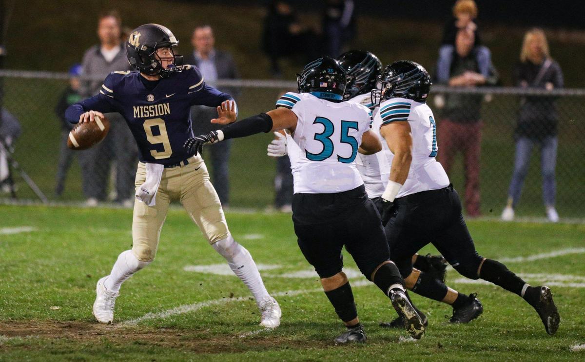 Quarterback Colby White was under pressure much of the night. Mission Prep fell to Kennedy 27-14 (from Delano) in a football playoff Nov. 18, 2022.