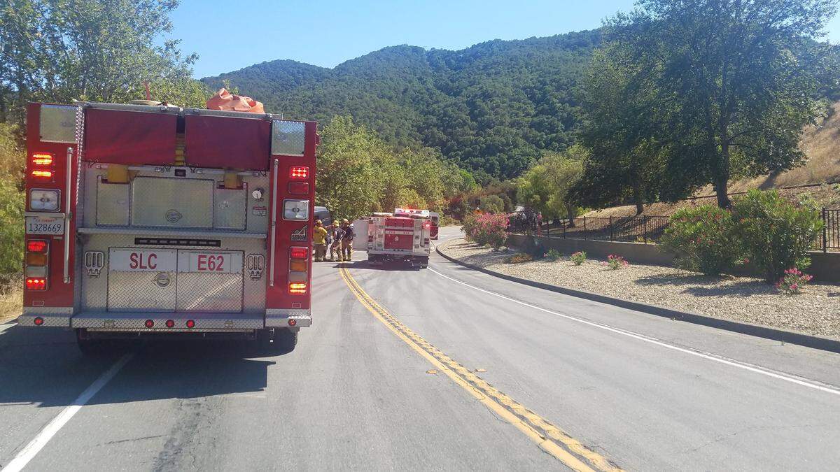 Paramedics respond to a fatal traffic collision on San Luis Bay Drive at Apple Orchard Lane in Avila Beach on Friday, Aug. 6, 2021.
