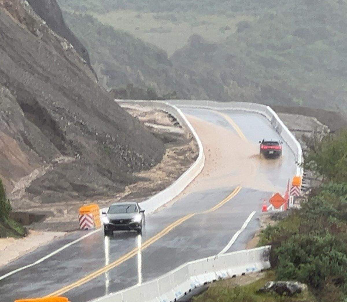 Rockslides and debris forced a full closure of Highway 1 from Ragged Point Inn to south of Deetjen’s Big Sur Inn on Feb. 16, 2026. Caltrans is working to remove mud and runoff from the hillside at the Regent’s Slide site.
