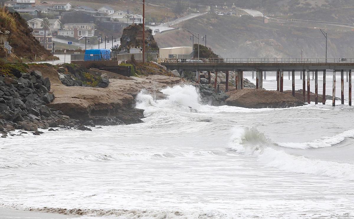 Heavy surf pounds the shore in Avila Beach as the second day of a winter storm moved through the county on Tuesday, Dec. 14, 2021.