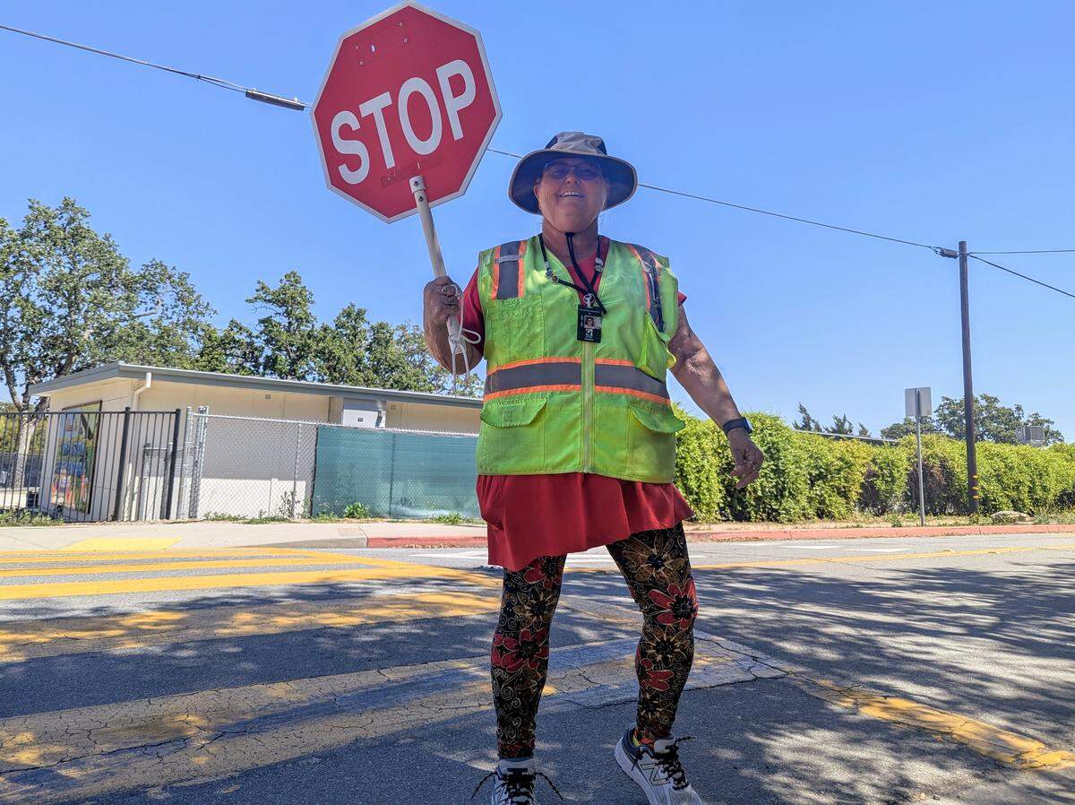 Templeton crossing guard Vicki Zimmerman stands at her post on Old County Road outside Templeton Elementary School.
