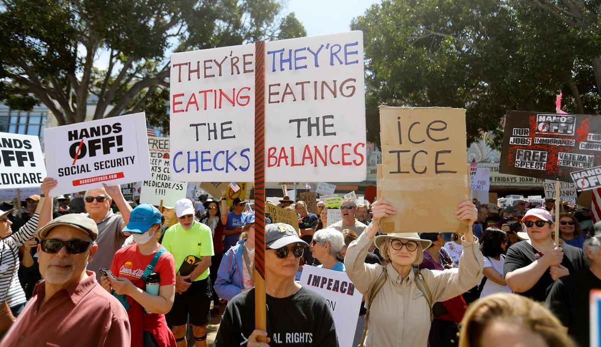 Thousands of people gather at San Luis Obispo Superior Court in California as part of the “Hands Off!” rally to protest President Donald Trump and his advisor Elon Musk.