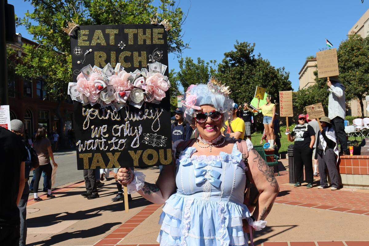 Thousands of people attended the No Kings rally in downtown San Luis Obispo to protest the Trump administration and support Prop. 50 on Oct. 18, 2025.