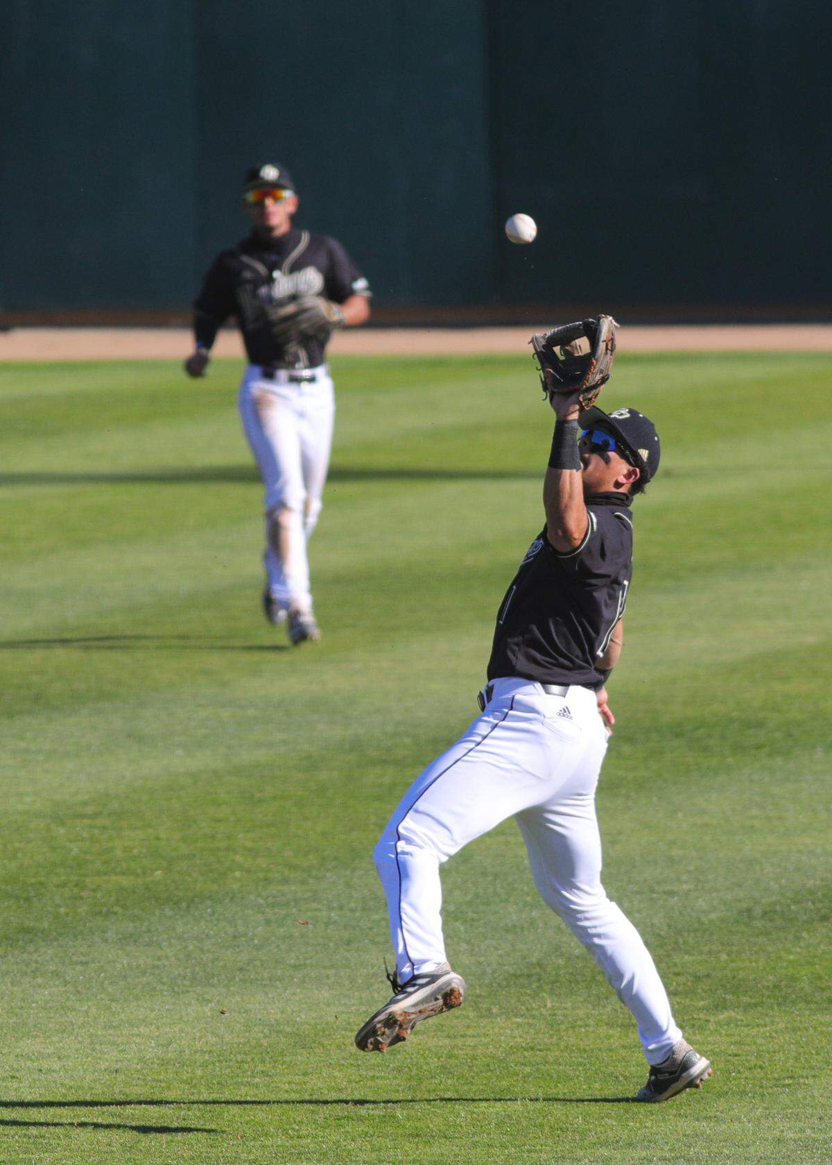 Taison Corio backs into up from second base to make a catch. Cal Poly hosted Nevada for a 4 game baseball series to open the season. The Mustangs are now 12-9 overall and 4-4 in Big West Conference play.