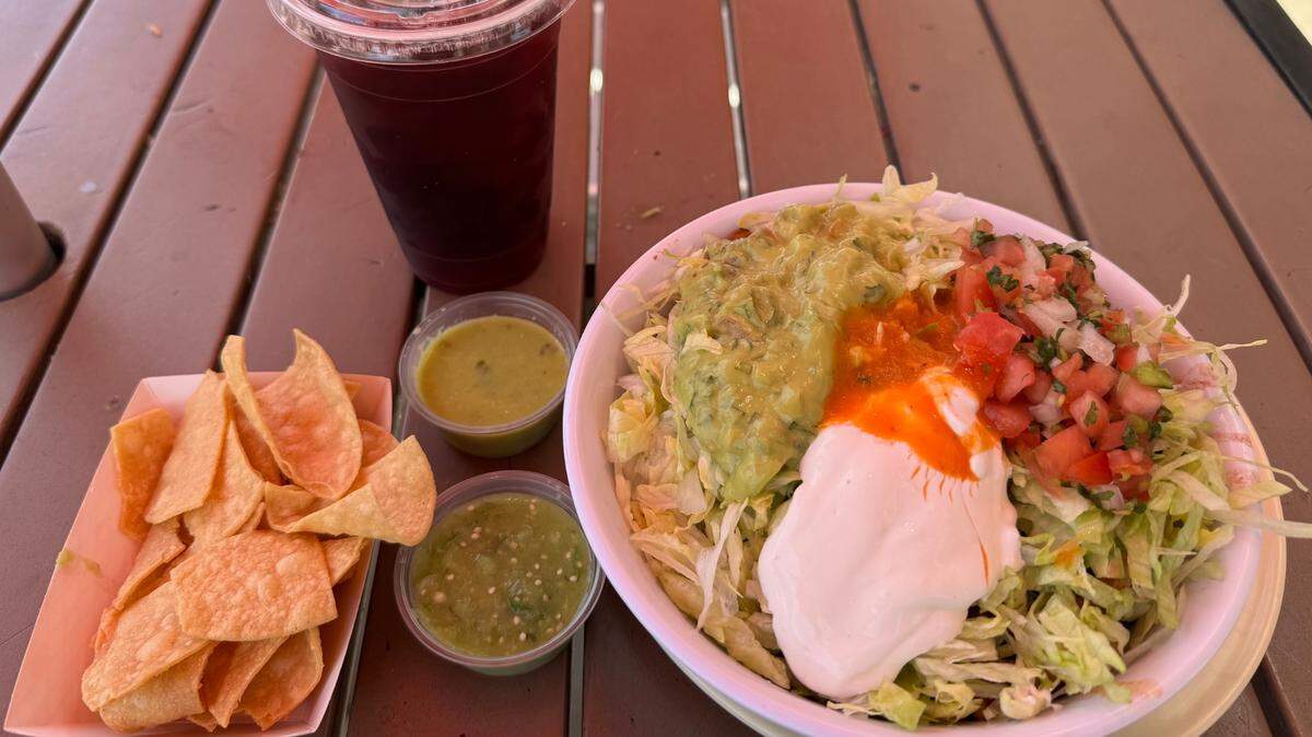 A burrito bowl, an agua fresca and chips and salsa from Taqueria Santa Cruz Express at 1308 Monterey St. in San Luis Obispo on June 17, 2025.