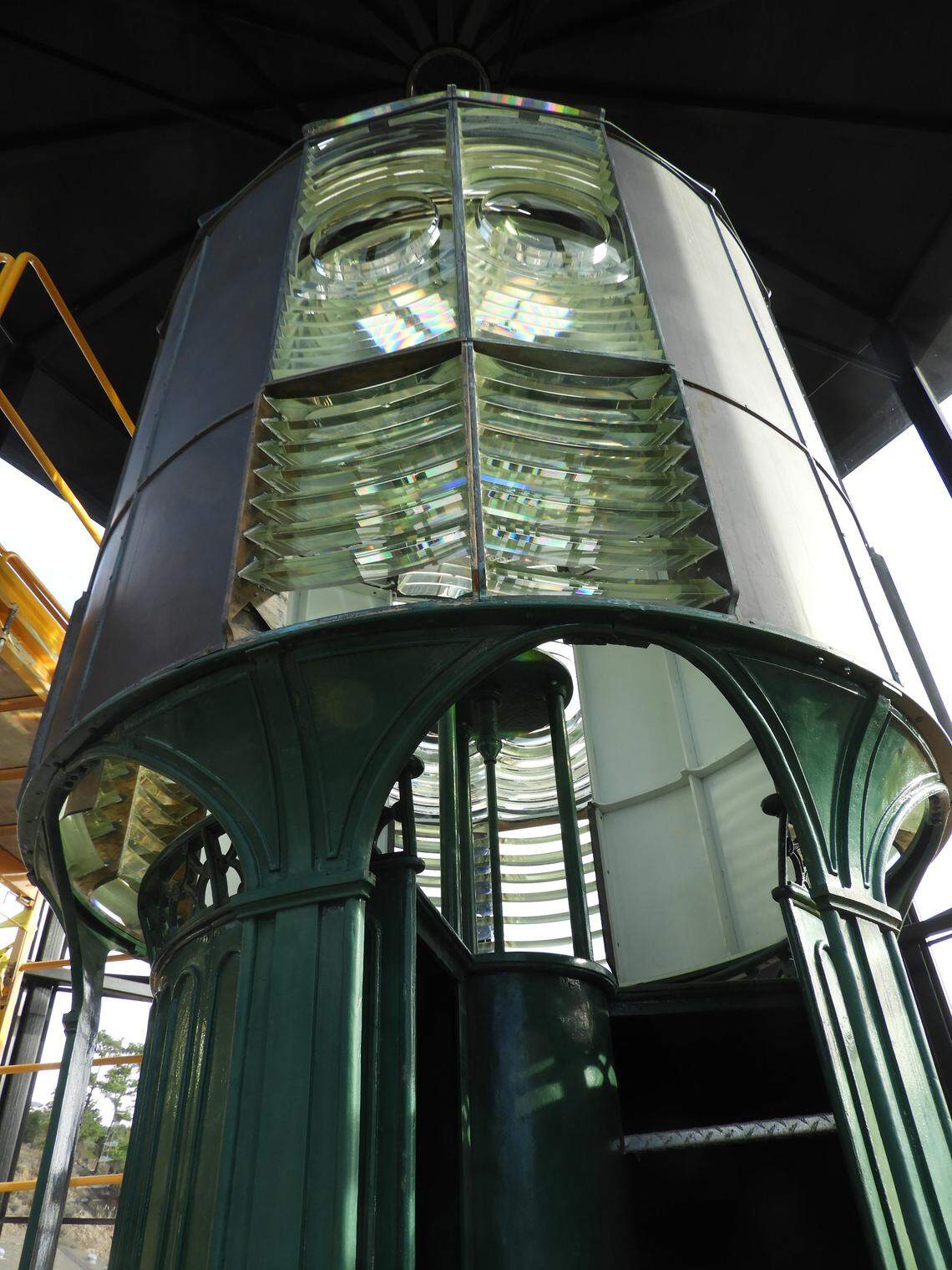 The prisms of the Piedras Blancas Lighthouse lens sparkle after the first day of cleaning.