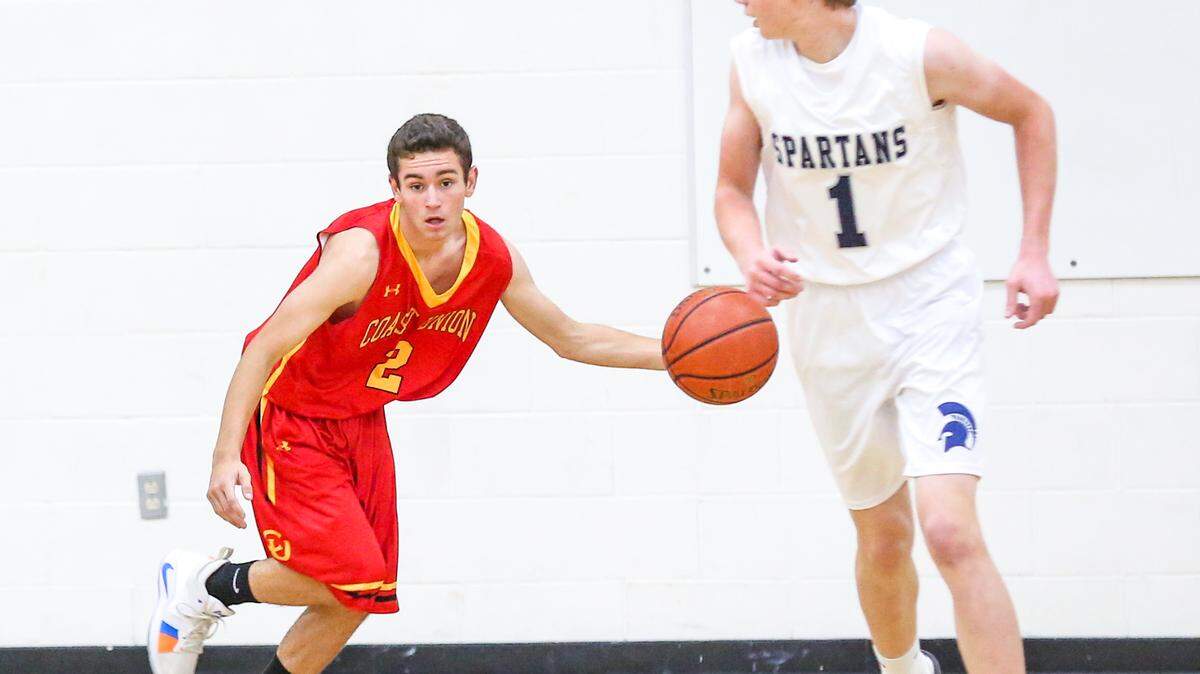 Bronco junior David Amodei has scored 79 points this season and has grabbed 30 rebounds. Here he controls the ball against Orcutt Academy earlier this season.