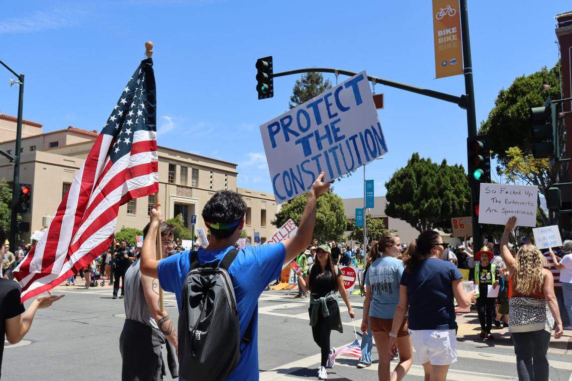 Thousands gathered in San Luis Obispo, California, for No Kings Day to protest executive overreach by the Trump administration on the President’s birthday.