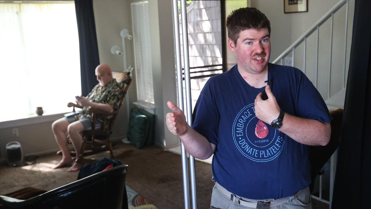Jim Shapiro, left, shares a space in his San Luis Obispo condo with Sam Matthews. They met through affordable housing program that background checks renters and homeowners July 12, 2022.