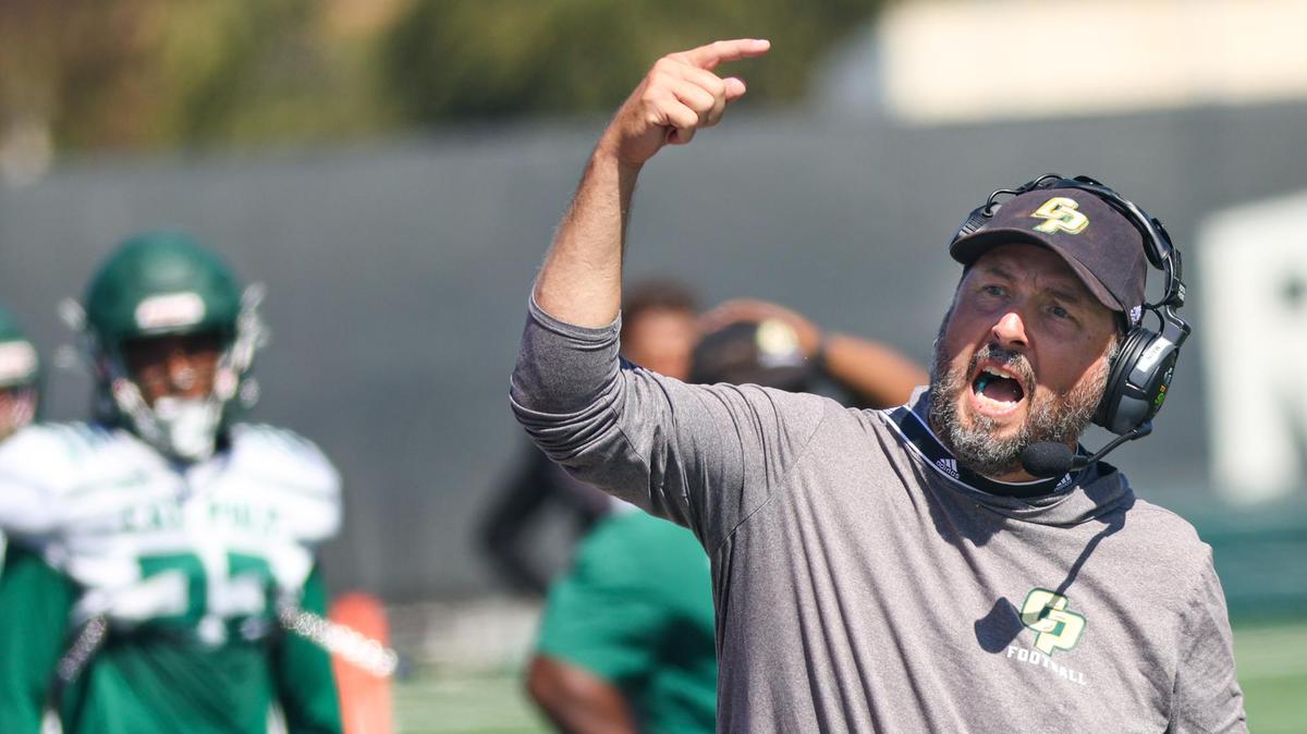 Head Coach Beau Baldwin calls out the next drill during Cal Poly’s football practice on Aug. 29, 2022. Baldwin has resigned as Cal Poly’s head coach.