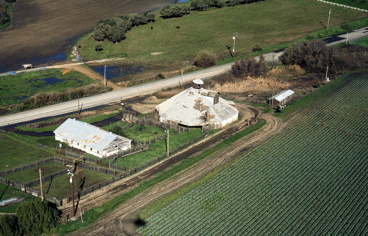 The Octagon Barn reaches a point of near-collapse before the land conservancy began restoration in 1998.