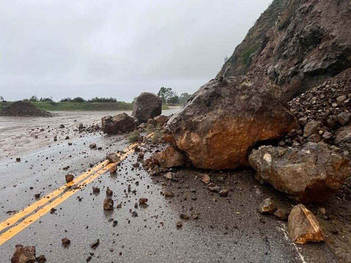 One of several rock slides closed Highway 1 between Ragged Point and Big Sur on Saturday, Dec. 31, 2022, as a powerful winter storm moved through the area.