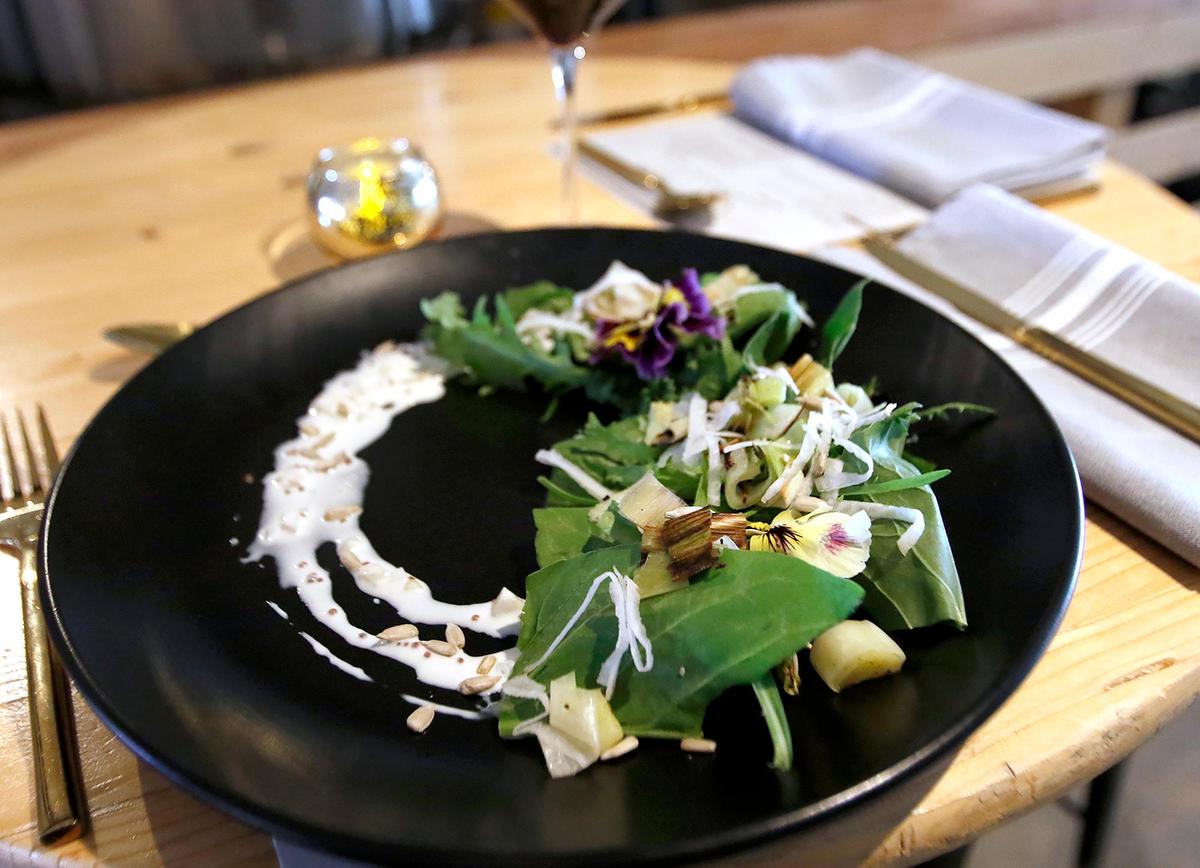 A dish simply named “Lettuce” is made with turnip, charred allium, buttermilk and seeds, at Pair with Dead Oak in Atascadero.